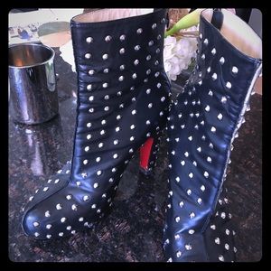 Louboutin boots. Runs small one size